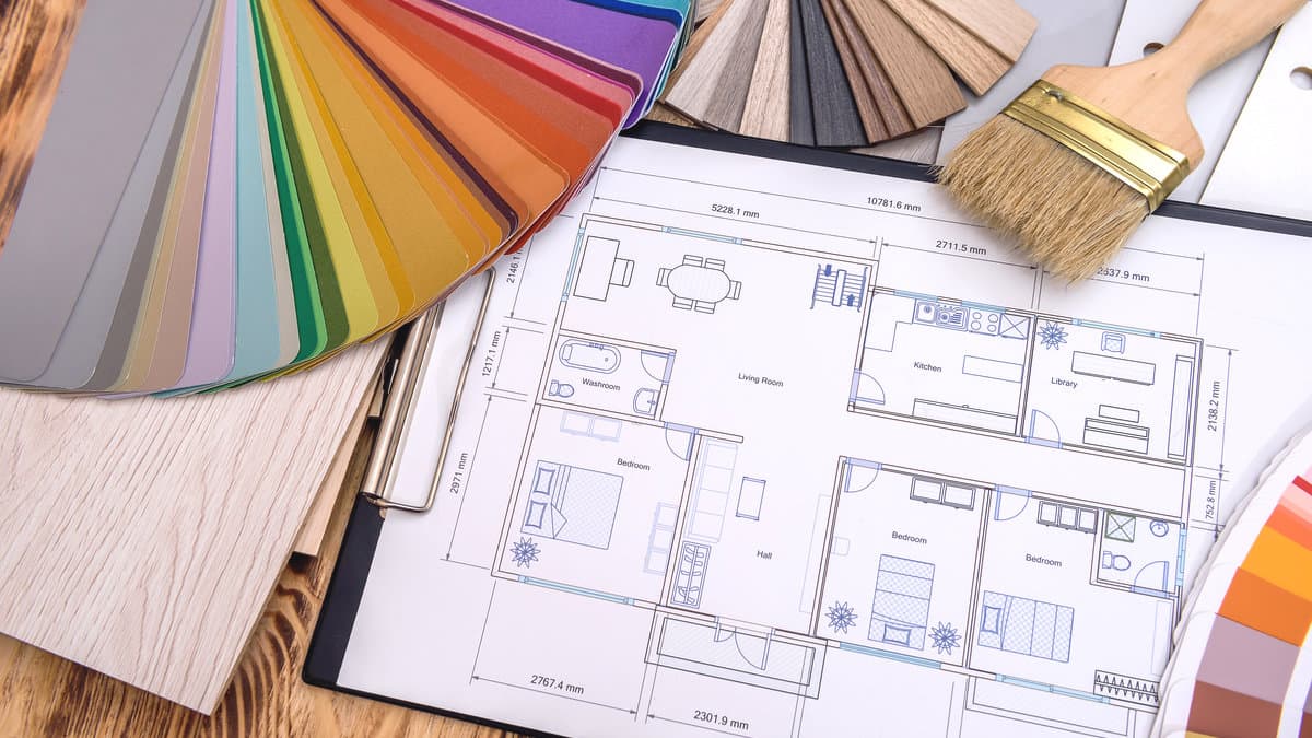 Paint color samples, material finishes, and house floor plans used to plan a professional painting estimate in Los Angeles.