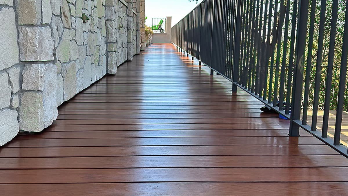 Refinished exterior hardwood deck at a luxury home in coastal Los Angeles by Tilo Martin Painting