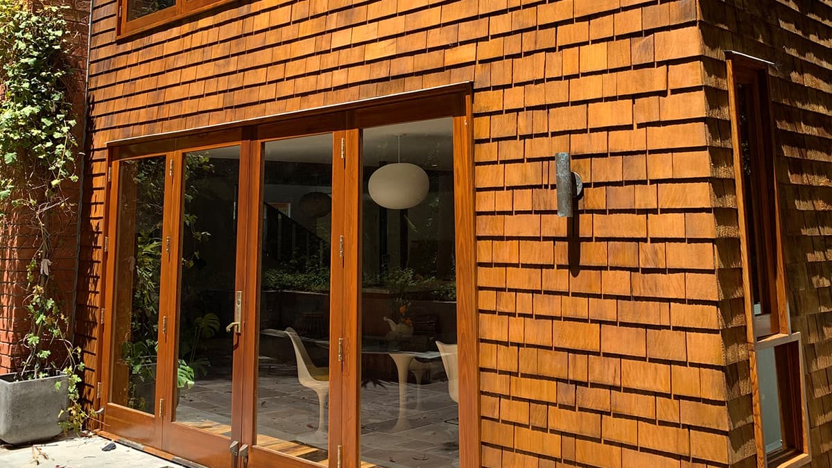 Cedar shingles after professional recoating on a Pacific Palisades home