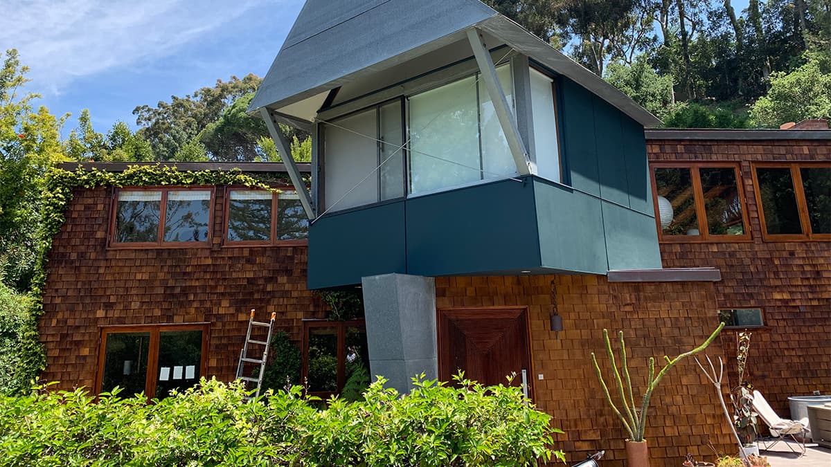 Cedar shingle exterior of a Pacific Palisades home during a professional recoating project